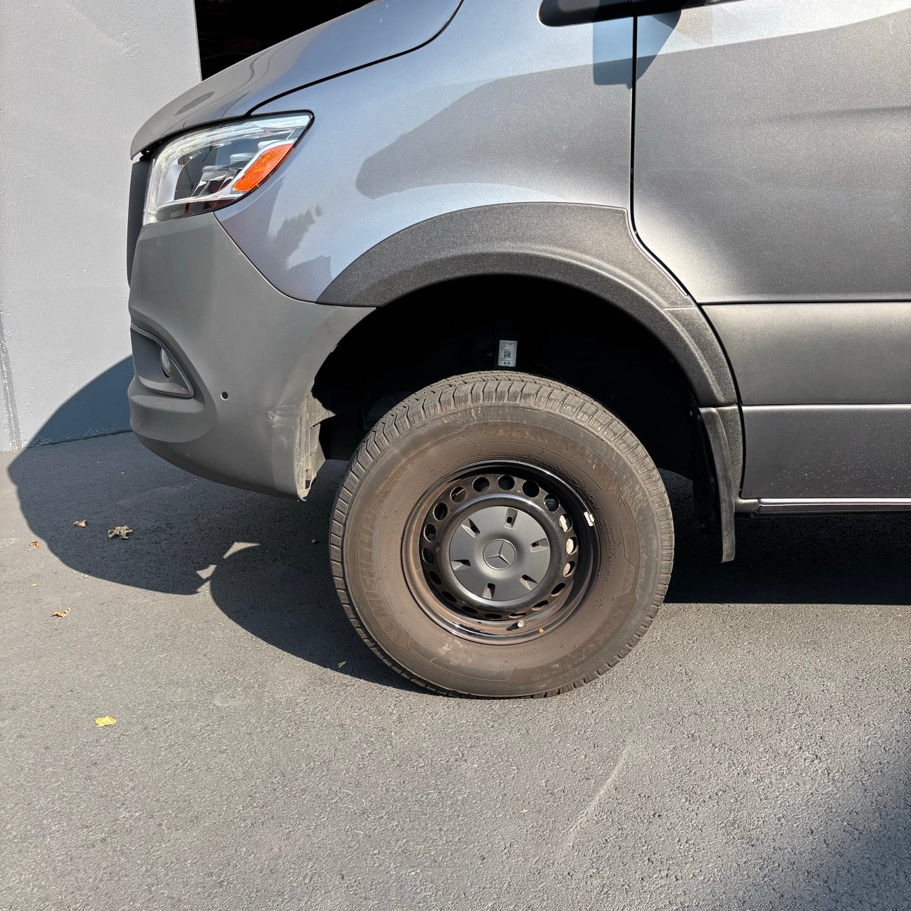 Rally Raider rear fender flare installed on gray Mercedes Sprinter