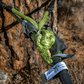 Green Kinetic-X soft shackle connected to a static bridle wrapped around a tree, demonstrating a secure and safe anchor setup for vehicle recovery.