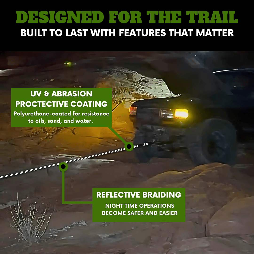 Off-road recovery at night showing a kinetic rope with reflective braiding and UV-resistant polyurethane coating connecting two vehicles on a rocky trail.